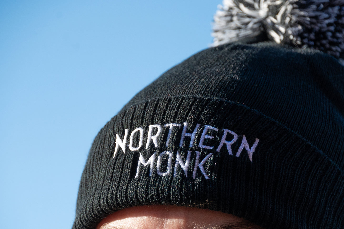 NORTHERN MONK BLACK BOBBLE HAT