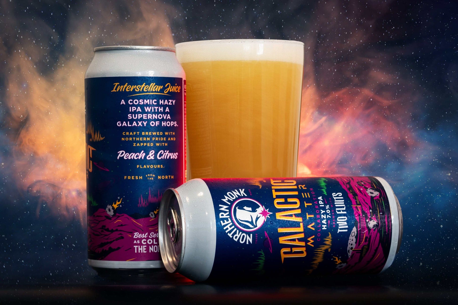 Galactic Matter Hazy IPA can with peach and citrus flavors beside a glass of hazy beer against a cosmic background.
